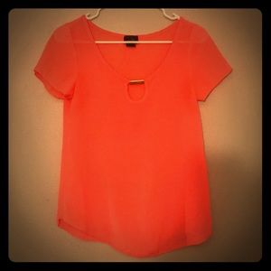 Bright peach blouse